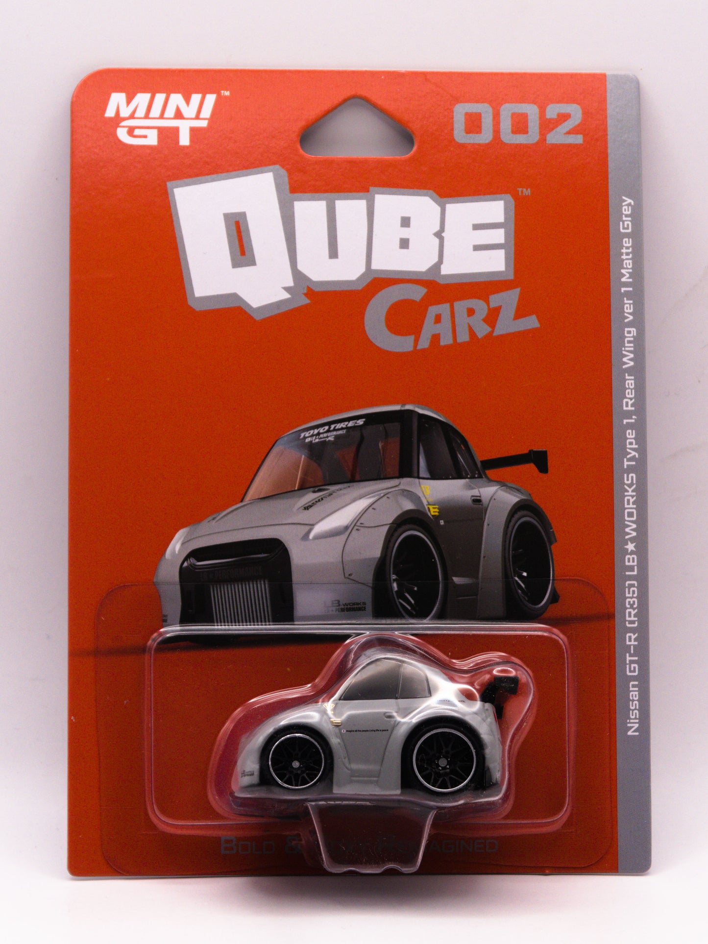 Mini GT Qube Carz 002 Nissan GT-R R34 LB Works Type 1 Gray
