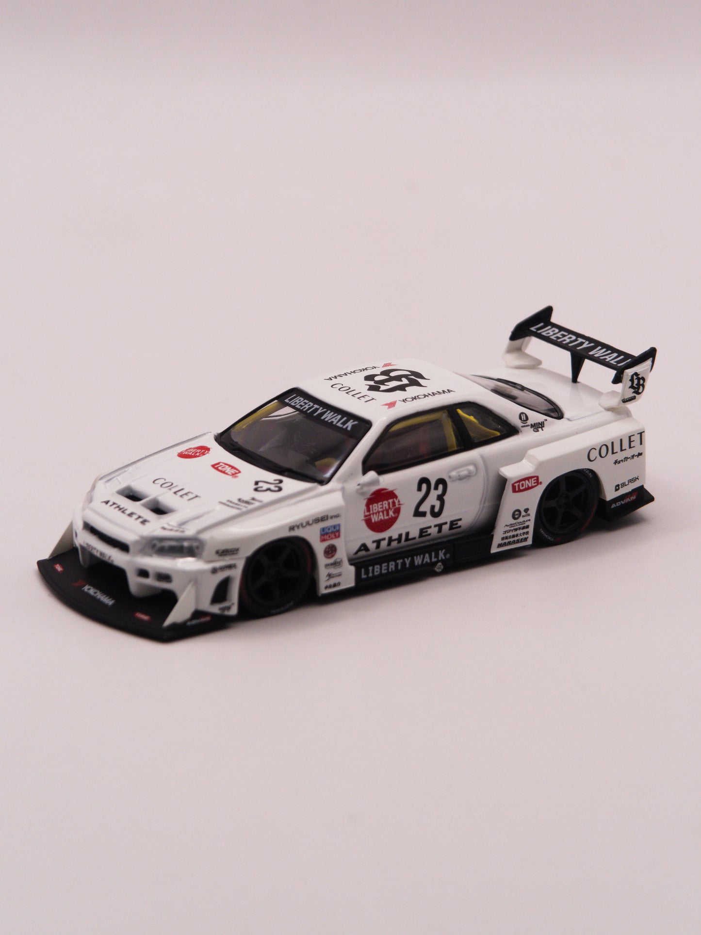 Mini GT #1059 Nissan Skyline GT-R R34 Liberty Walk Super Silhouette Athlete White *BLISTER