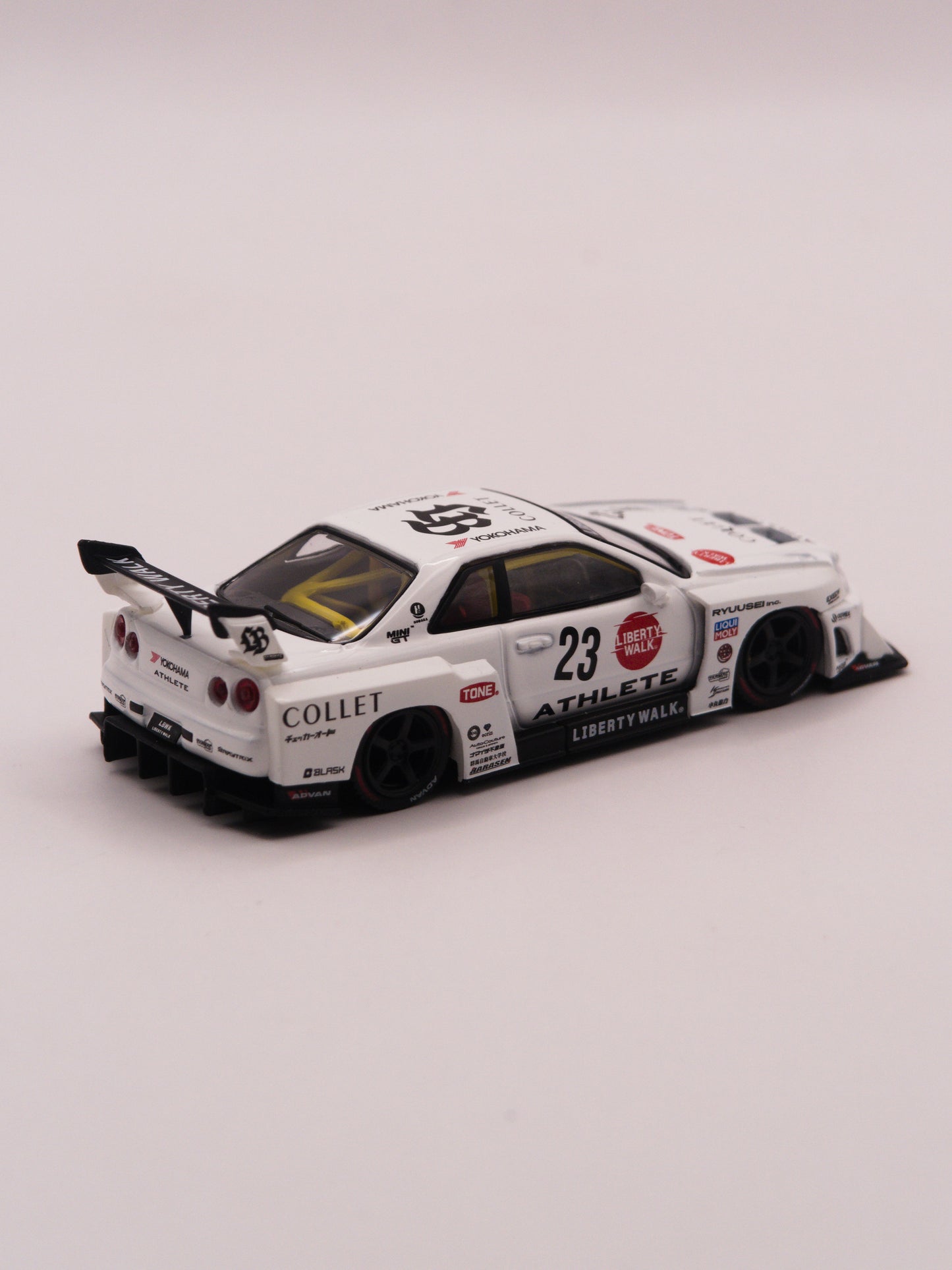 Mini GT #1059 Nissan Skyline GT-R R34 Liberty Walk Super Silhouette Athlete White *BLISTER